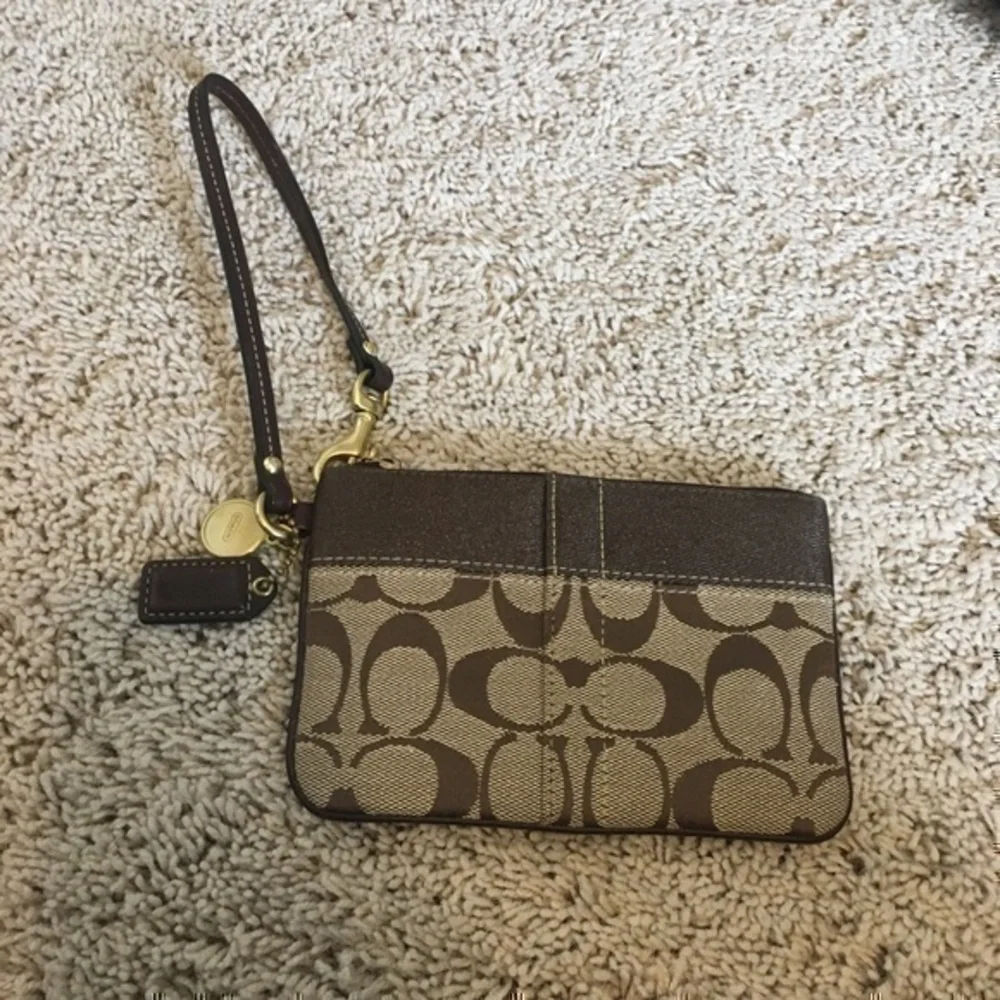 Coach Khaki signature stripe wristlet